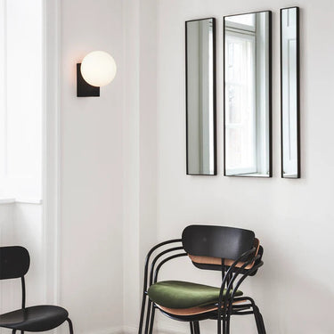 Modern Scandinavian living room featuring the &Tradition Journey SHY2 wall sconce by Signe Hytte.