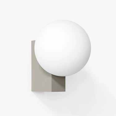 Geometric Journey SHY2 wall lamp by &Tradition showing the contrast between sphere and rectangle. 