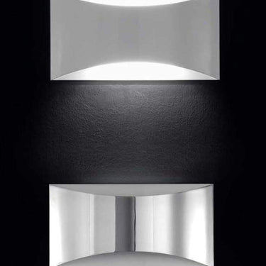 Chrome Kelly 791 wall lamp by Oluce for office and hotel interiors