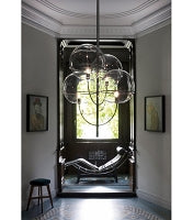 Lyndon pendant light by Oluce with transparent glass globes and chrome-plated me