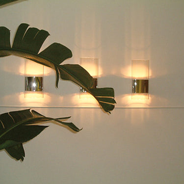 Designer Line Wall Lamp by Oluce with indirect lighting in polished aluminum and Pyrex glass