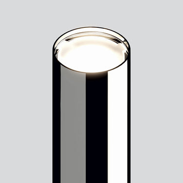 Black  Croma floor lamp by Lodes, highlighting the elegant metallic fade and upward light direction.