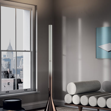 Bronze Croma floor lamp's rotating ring dimmer on its stem, controlling the warm dim LED.