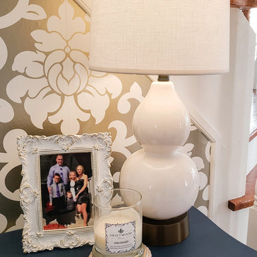 Mini Norma Jean Ivory Ceramic Cordless Table Lamp Black turned on