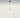 Modern dimmable LED suspension light NH 35 by Artemide with white glass and brass ring for living room décor