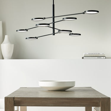 Black and Brass LED Chandelier with Rotating Arms – Spectica 8-Light Fixture, Dining Area