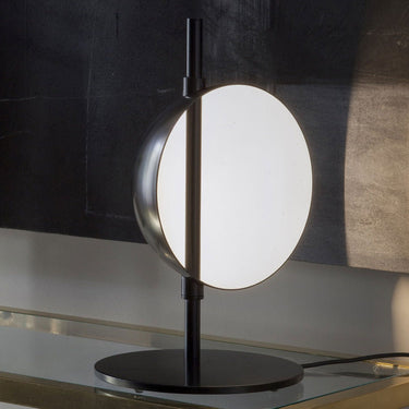 Oluce Superluna LED table lamp with adjustable light and minimalist metal design