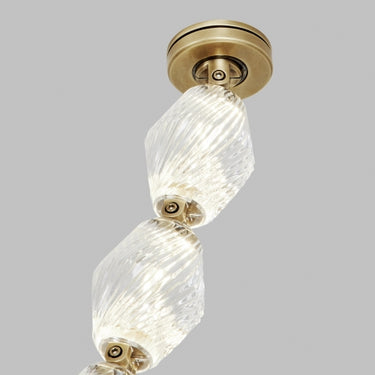 Modern Collier 48 Pendant Light hanging over a dining table