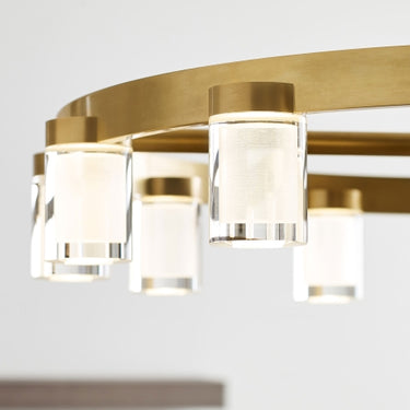 Natural brass finish modern sphere shaped LED chandelier.