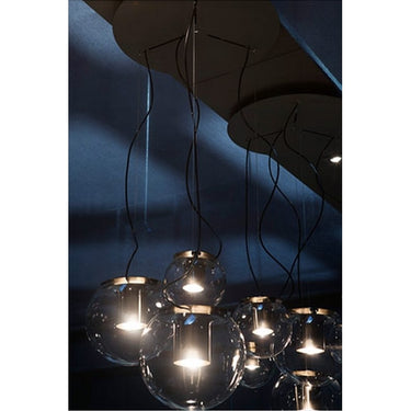 Contemporary hanging lamp with transparent blown glass sphere and dimmable LED