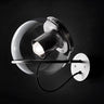 Designer Globe Wall Lamp by Oluce in satin gold with diffused LED light for bedroom walls