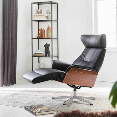 Conform Sweden Timeout ergonomic recliner with black leather upholstery and walnut finish