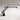 Side view of Artemide Tizio 35 Lamp illuminating a desk