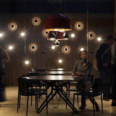 Contemporary designer wall lamp by Angeletti & Ruzza with clear curved glass