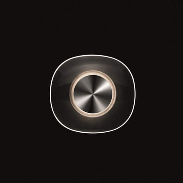 Italian designer wall sconce with dual glass layers and metal reflector