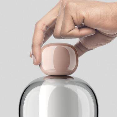 Close-up of the Lodes Easy Peasy lamp's pommel control for on/off and dimming functionality.
