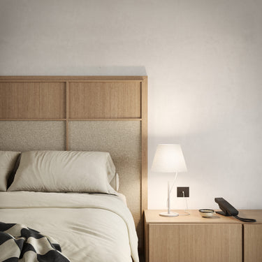 Modern white LED table lamp with floating paper shade for minimalist interiors