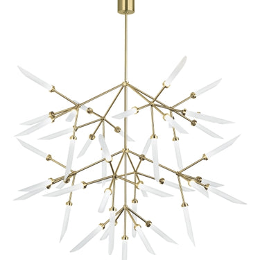 Aged Brass Spur Grande by Sean Lavin, shown against white